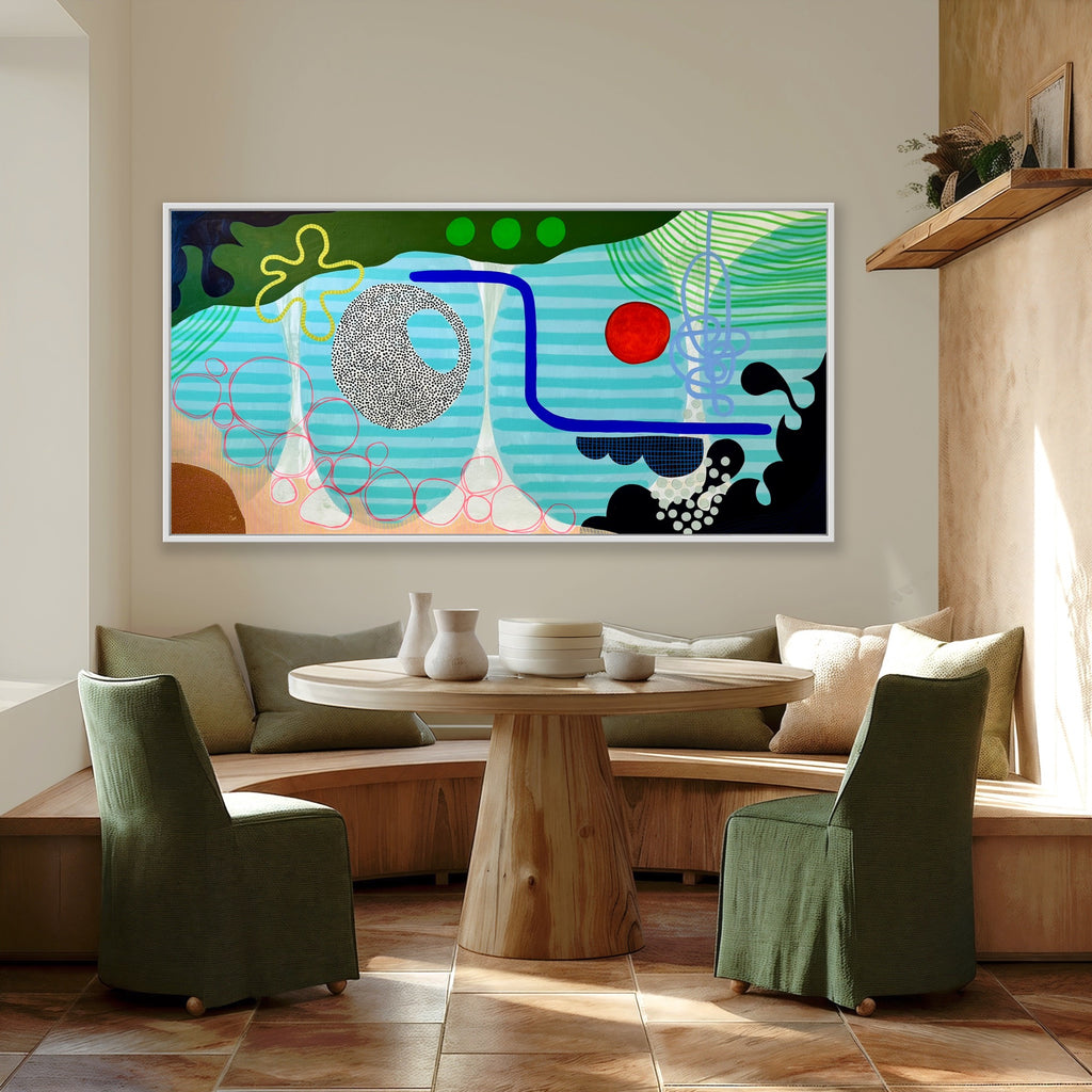 Modern living room with abstract artwork on the wall, wooden table, and green chairs.